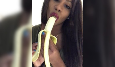 ASMR video of a beautiful black babe sensually and seductively eating a banana