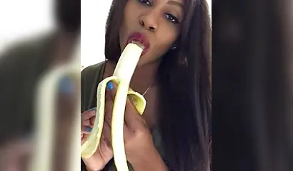 ASMR video of a beautiful black babe sensually and seductively eating a banana