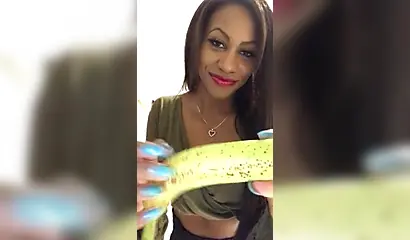 ASMR video of a beautiful black babe sensually and seductively eating a banana