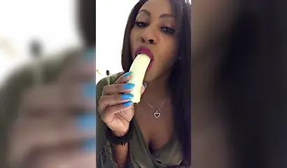ASMR video of a beautiful black babe sensually and seductively eating a banana
