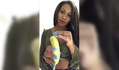 ASMR video of a beautiful black babe sensually and seductively eating a banana