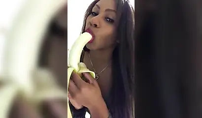ASMR video of a beautiful black babe sensually and seductively eating a banana