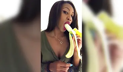 ASMR video of a beautiful black babe sensually and seductively eating a banana