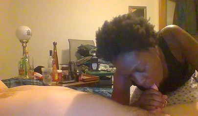 Curly ebony amateur gives a long and sloppy blowjob and deepthroat to a white cock