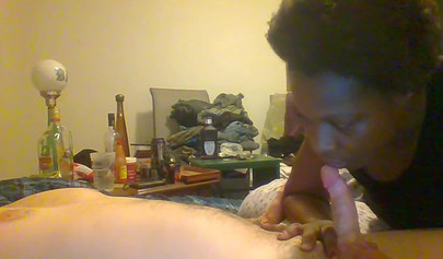 Curly ebony amateur gives a long and sloppy blowjob and deepthroat to a white cock