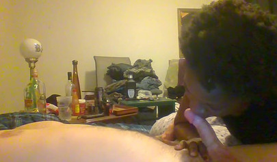 Curly ebony amateur gives a long and sloppy blowjob and deepthroat to a white cock