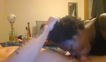 Curly ebony amateur gives a long and sloppy blowjob and deepthroat to a white cock