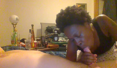 Curly ebony amateur gives a long and sloppy blowjob and deepthroat to a white cock