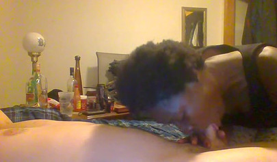 Curly ebony amateur gives a long and sloppy blowjob and deepthroat to a white cock