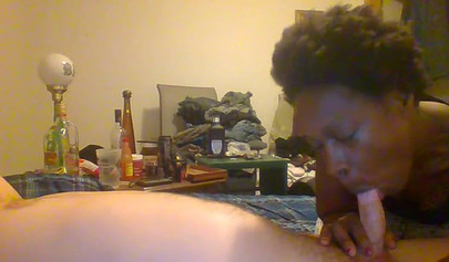 Curly ebony amateur gives a long and sloppy blowjob and deepthroat to a white cock