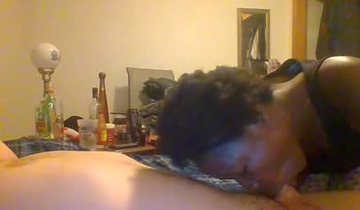 Curly ebony amateur gives a long and sloppy blowjob and deepthroat to a white cock