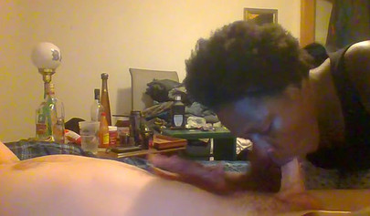 Curly ebony amateur gives a long and sloppy blowjob and deepthroat to a white cock