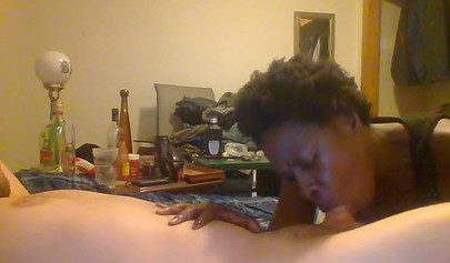 Curly ebony amateur gives a long and sloppy blowjob and deepthroat to a white cock