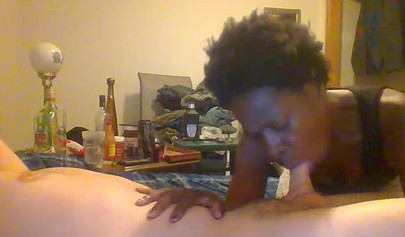 Curly ebony amateur gives a long and sloppy blowjob and deepthroat to a white cock