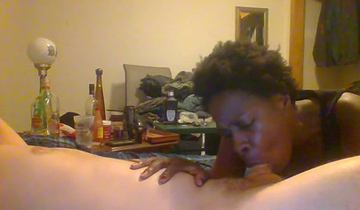 Curly ebony amateur gives a long and sloppy blowjob and deepthroat to a white cock