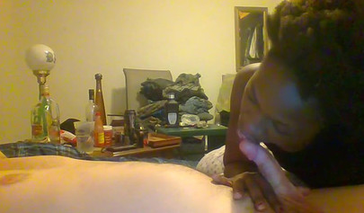 Curly ebony amateur gives a long and sloppy blowjob and deepthroat to a white cock