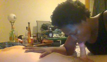 Curly ebony amateur gives a long and sloppy blowjob and deepthroat to a white cock