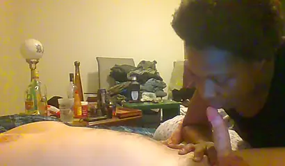 Curly ebony amateur gives a long and sloppy blowjob and deepthroat to a white cock