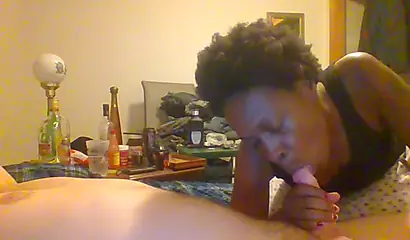 Curly ebony amateur gives a long and sloppy blowjob and deepthroat to a white cock