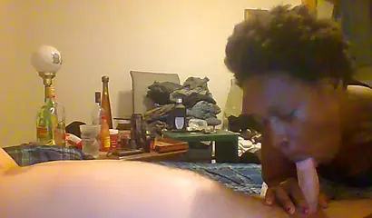 Curly ebony amateur gives a long and sloppy blowjob and deepthroat to a white cock