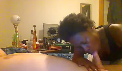 Curly ebony amateur gives a long and sloppy blowjob and deepthroat to a white cock