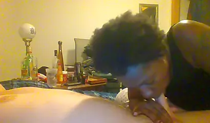 Curly ebony amateur gives a long and sloppy blowjob and deepthroat to a white cock