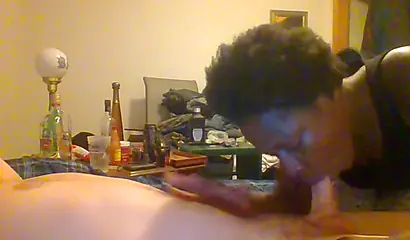 Curly ebony amateur gives a long and sloppy blowjob and deepthroat to a white cock