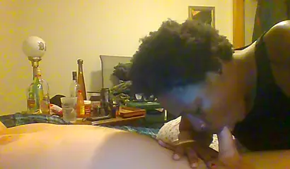 Curly ebony amateur gives a long and sloppy blowjob and deepthroat to a white cock