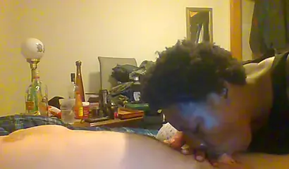 Curly ebony amateur gives a long and sloppy blowjob and deepthroat to a white cock