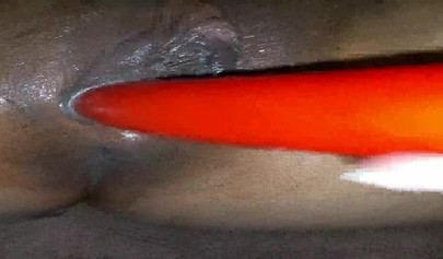 Horny ebony amateur girl gives an erotic performance by dildoing both of her holes