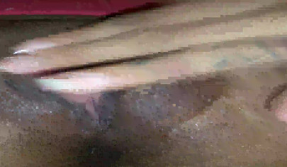 Horny ebony amateur girl gives an erotic performance by dildoing both of her holes