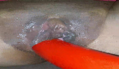 Horny ebony amateur girl gives an erotic performance by dildoing both of her holes