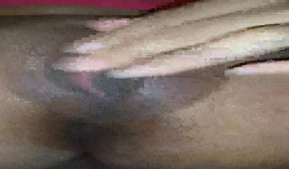 Horny ebony amateur girl gives an erotic performance by dildoing both of her holes