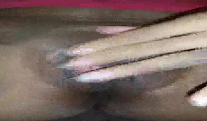 Horny ebony amateur girl gives an erotic performance by dildoing both of her holes