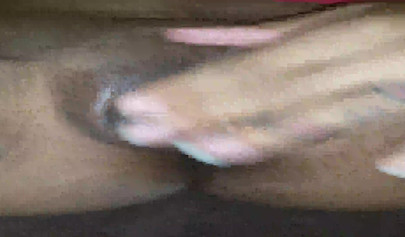 Horny ebony amateur girl gives an erotic performance by dildoing both of her holes