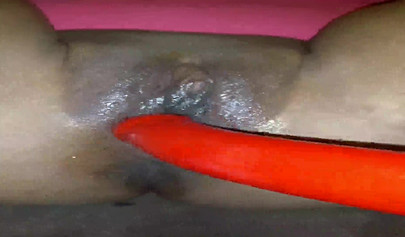 Horny ebony amateur girl gives an erotic performance by dildoing both of her holes