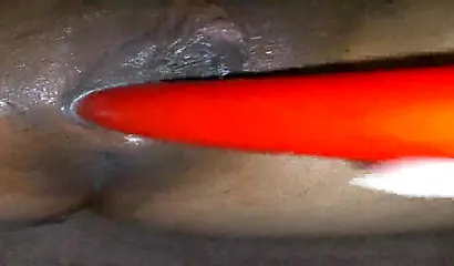 Horny ebony amateur girl gives an erotic performance by dildoing both of her holes