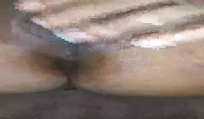 Horny ebony amateur girl gives an erotic performance by dildoing both of her holes