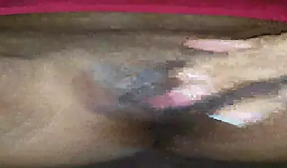 Horny ebony amateur girl gives an erotic performance by dildoing both of her holes