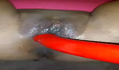 Horny ebony amateur girl gives an erotic performance by dildoing both of her holes