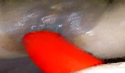 Horny ebony amateur girl gives an erotic performance by dildoing both of her holes