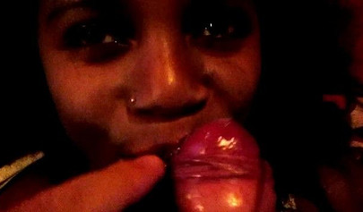 Curly black chick swallows a hard white dick before having her pussy hammered