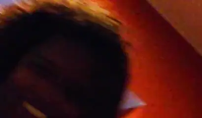 Curly black chick swallows a hard white dick before having her pussy hammered