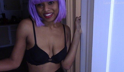 Adorable young black chick with purple hair gives a long and sloppy dildo blowjob