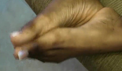 Two cute ebony girls have fun with each other and show off their beautiful feet