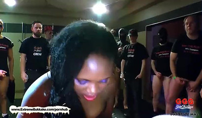 Lusty ebony enjoys sucking and riding multiple cocks before being sprayed with cum