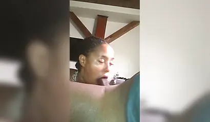 Lusty black girl enjoys giving a sloppy blowjob before being railed from behind