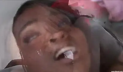 Dazzling black babe gives a sloppy blowjob before being hammered by a huge dick