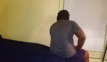 Ebony amateur slobbers on a big black cock before taking it balls deep in her cunt