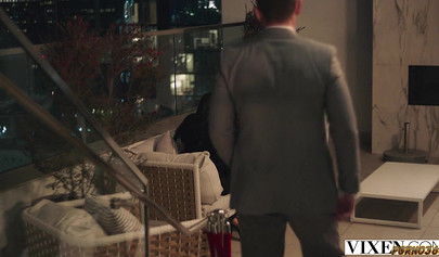 Passionate beauties riding a huge cock during a threesome